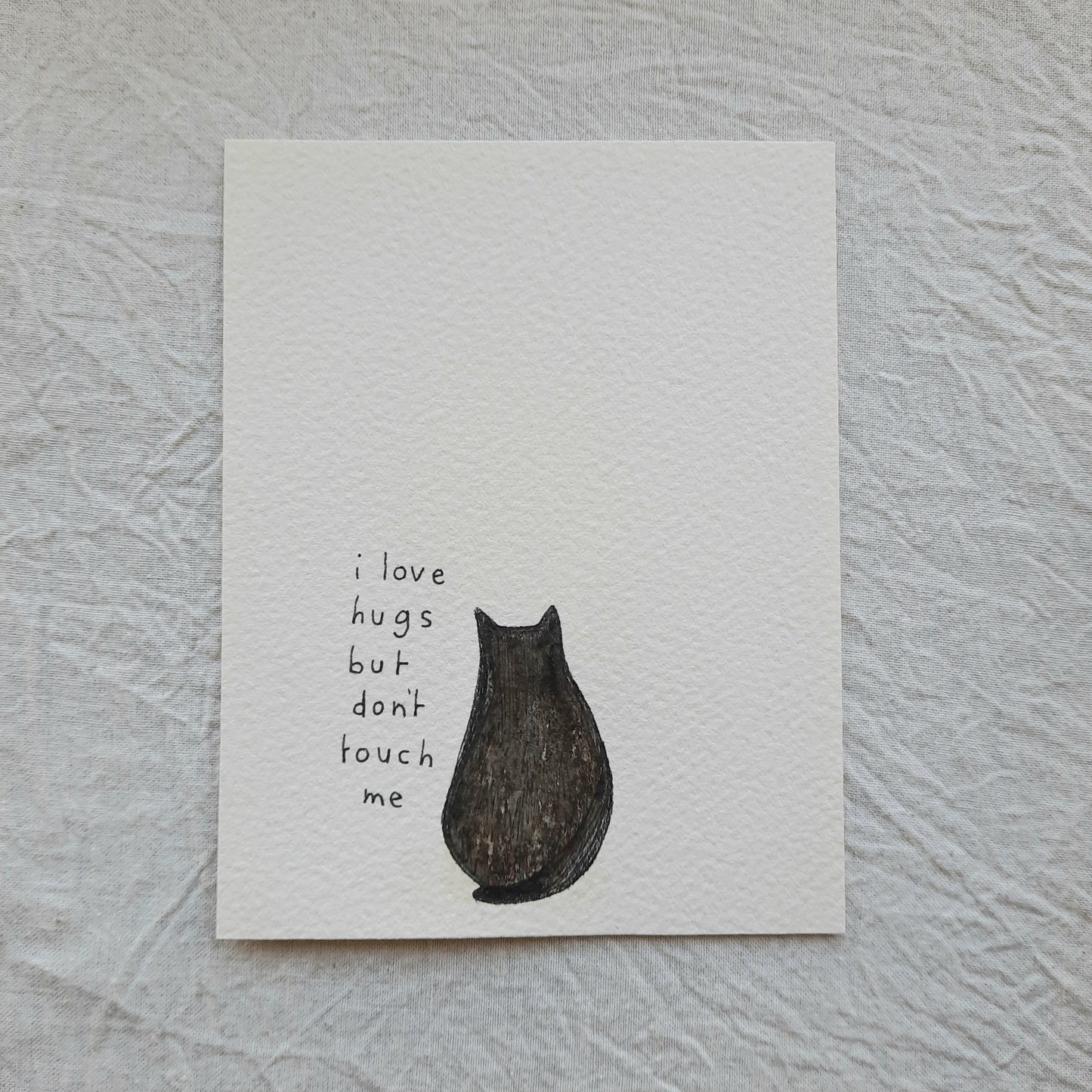 when a cat turns their back